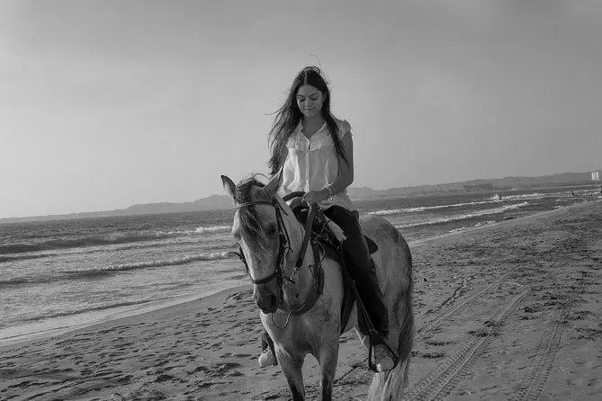 Horse Back Riding on a Beach photo 3